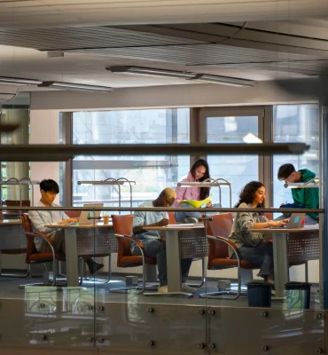 students-studying-indoors-full-shot